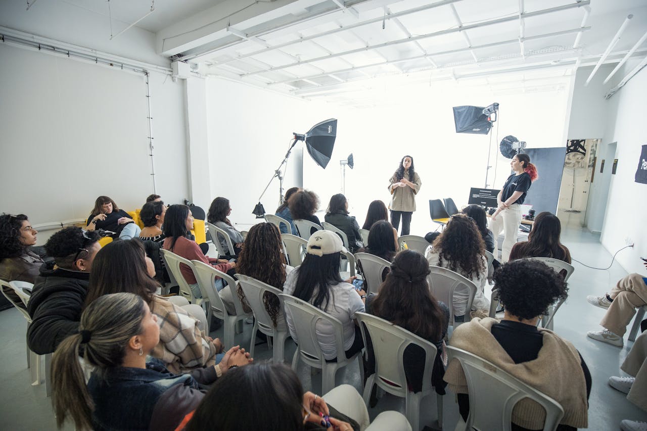 Captivating group workshop in a bright photography studio with diverse participants.